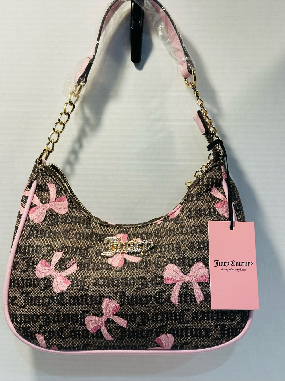 Juicy Couture Brown Monogram Shoulder Bag with Pink Bow Accents